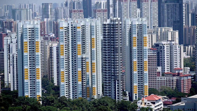 This photograph taken on August 19, 2019 shows private and public housing in Singapore. (Photo by Roslan RAHMAN / AFP)