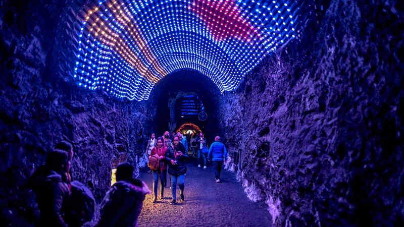 Tourists visit the Salt Cathedral of Zipaquira, an underground church built into a mine that produces salt, 45 km north of Bogota, on August 19, 2019. (Photo by JUAN BARRETO / AFP)