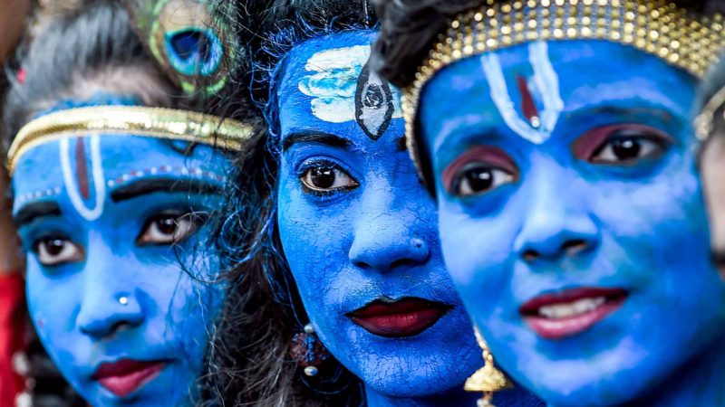 Students dressed up as Hindu gods Lord Krishna and Lord Shiva participate in a cultural event in their school in Mumbai on August 21, 2019. (Photo by Indranil MUKHERJEE / AFP)