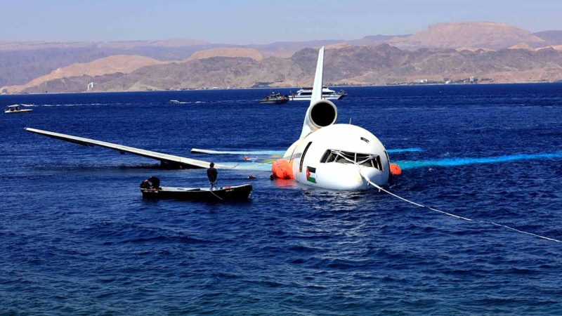 (190826) -- AQABA (JORDAN), Aug. 26, 2019 (Xinhua) -- A Lockheed L-1011 Tristar plane is submerged in the Red Sea in Aqaba, Jordan, on Aug. 26, 2019. The Aqaba Special Economic Zone Authority (ASEZA) in Jordan on Monday sunk a disused commercial aircraft to Aqaba's Underwater Military Museum Dive Site to help boost marine life. (Photo by Mohammad Abu Ghosh/Xinhua)