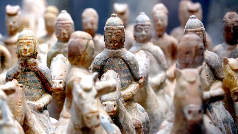 (190828) -- BEIJING, Aug. 28, 2019 (Xinhua) -- Photo taken on Aug. 27, 2019 shows pottery figurines during an exhibition at Zhengzhou Museum in central China's Henan Province. The exhibition on major archaeological discoveries and research achievements in Henan in the past 70 years kicked off here on Tuesday, displaying 1,225 sets of exhibits. (Xinhua/Li An)