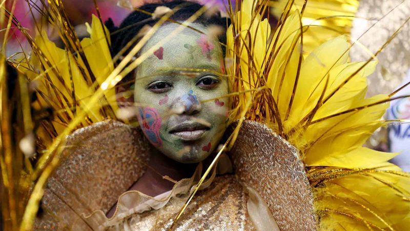 LONDON, -- A performer participates in the 2019 Notting Hill Carnival Family Day in London, Britain on Aug. 25, 2019. Originated in the 1960s, the carnival is a way for Afro-Caribbean communities to celebrate their cultures and traditions. Xinhua/RSS.