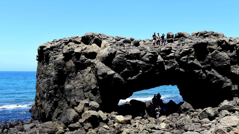  TAIPEI -- Tourists enjoy themselves at the Whale Cave on the coastline in Penghu, southeast China's Taiwan, Aug. 28, 2019. Xinhua/RSS.