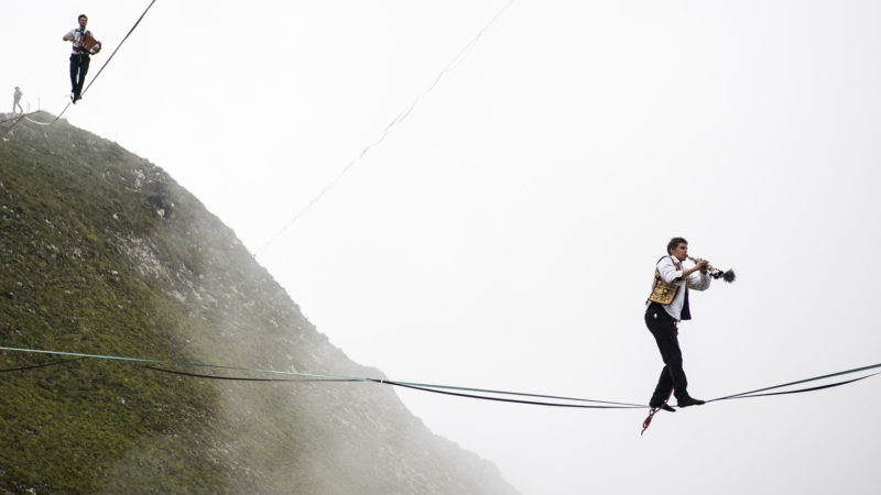 Two highliner perform during the Highline Extreme event on the top of the Moleson peak at 2000 meters above the sea level, in the Swiss Alps, near Gruyeres, Switzerland, Saturday, Sept. 7, 2019. Photo/RSS 