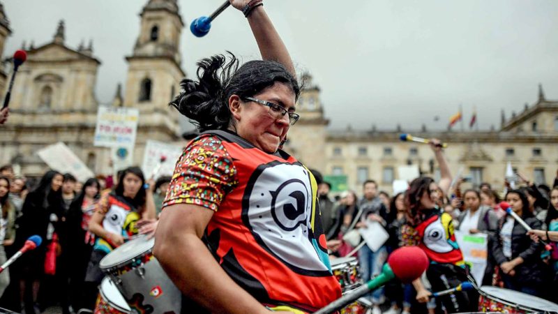 Musicians perform during a protest at Bolivar square in Bogota, Colombia, on September 20, 2019, in the framework of the "Friday for the planet" global demo against climate change. - A Youth Climate Summit will take place at the United Nations on Saturday. UN Secretary-General Antonio Guterres will then host an emergency summit on Monday in which he will urge world leaders to raise their commitments made in the 2015 Paris climate accord. (Photo by JUAN BARRETO / AFP)