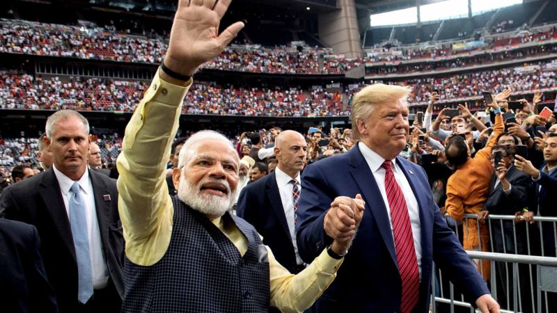 US President Donald Trump and Indian Prime Minister Narendra Modi attend "Howdy, Modi!" at NRG Stadium in Houston, Texas, September 22, 2019. - Tens of thousands of Indian-Americans converged on Houston on Sunday for an unusual joint rally by Donald Trump and Narendra Modi, a visible symbol of the bond between the nationalist-minded leaders. With many in the crowd decked out in formal Indian attire or the signature saffron of Modi's Bharatiya Janata Party, the event kicked off in a football stadium with a Sikh blessing, boisterous bhangra dancing and, in a nod to local customs, cheerleaders in cowboy hats. (Photo by SAUL LOEB / AFP)
