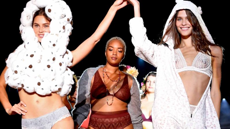 Models present creations by Etam during the Etam Live Show on the first day of the Paris Fashion Week, at the Roland Garros stadium in Paris, on September 24, 2019. (Photo by Bertrand GUAY / AFP)