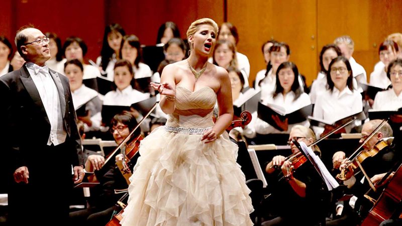 NEW YORK -- Artists Katrin Bulke (R, Front) and Lai Jianping (L, Front) perform "Brindisi" from La Traviata during the Symphonic Concert of Centennial Classics in Lincoln Center, New York, the United States, on Sept. 15, 2019. The concert was staged here on Sunday to mark the 70th anniversary of the founding of the People's Republic of China and the 40th anniversary of the establishment of China-U.S. diplomatic relations. Xinhua/RSS.