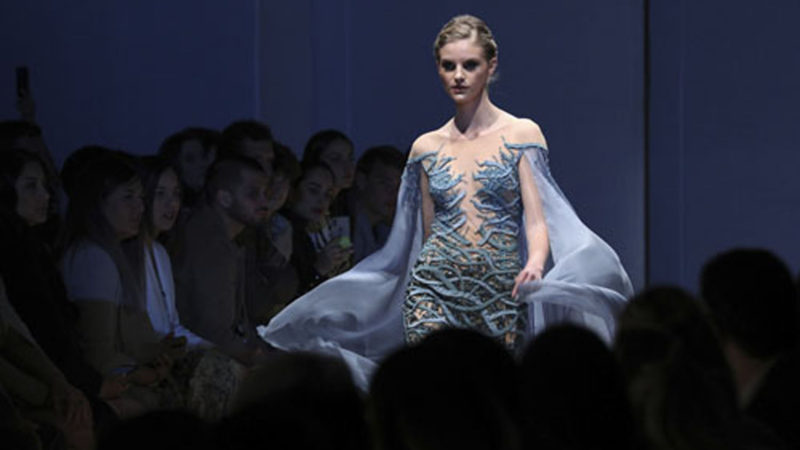 A model wears a creation from the Jose Zafra spring summer collection during Fashion Week, in Lima, Peru, Thursday, Oct. 10, 2019. AP Photo/RSS