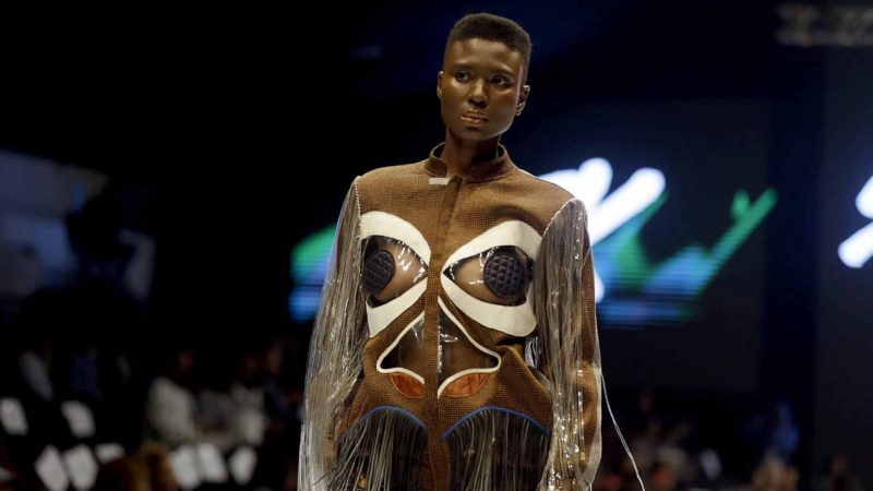 A model displays a creation by SRK during the Heineken Fashion and Design Week in Lagos, Nigeria, Thursday, Oct. 24, 2019. (AP Photo/Sunday Alamba)