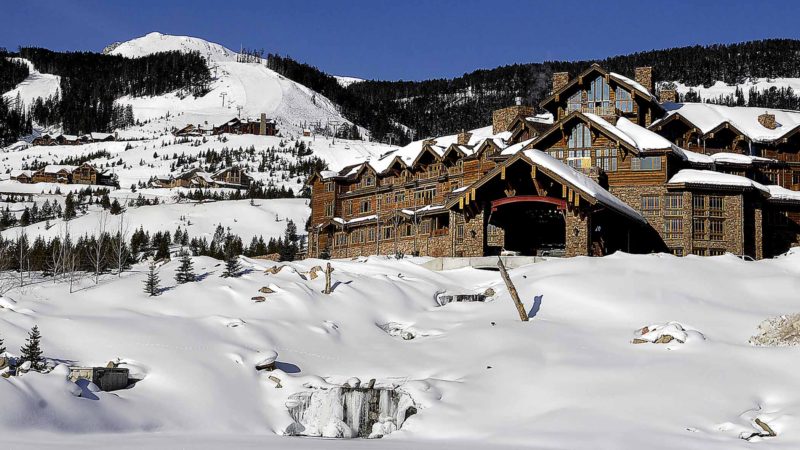 FILE-This undated file photo shows the Yellowstone Club near Big Sky, Mont. Five former workers are suing the club and a hospitality staffing agency alleging they and more than 100 other workers recruited from Jamaica were discriminated against and paid less than non-Jamaican workers doing the same job. The club and the employees declined to comment ahead of Wednesday's mediation session in Missoula. The exclusive ski resort counts Bill Gates, Justin Timberlake and Tom Brady as members. (Erik Petersen/Bozeman Daily Chronicle via AP)