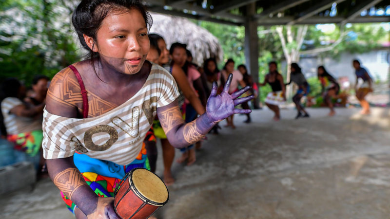 Natives of the Embera ethnic group dance at the Ipeti Embera community, near Torti, Chepo district, Panama, on October 15, 2019. - On October 16, the Embera indigenous community will attempt to enter the Guinness World Record, by cooking the largest patacon in the world. Photo/RSS