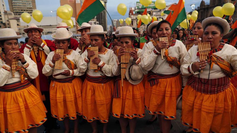 Supporters of Carlos Mesa, presidential candidate with the Citizen Community party (CC), play Andean flutes during his closing campaign rally in La Paz, Bolivia, Tuesday, Oct. 15, 2019. Bolivia will hold general elections on Oct. 20. (AP Photo/Juan Karita)