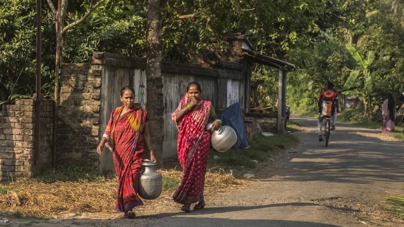 (191016) -- KOLKATA, Oct. 16, 2019 (Xinhua) -- Female villagers carry collected drinking water on the International Day of Rural Women at Narayanpur village, some 45 km away from Kolkata, India on Oct. 15, 2019. The first International Day of Rural Women was observed on Oct. 15, 2008. The day, established by the UN General Assembly on Dec. 18, 2007, recognizes the critical role and contribution of rural women, including indigenous women, in enhancing agricultural and rural development, improving food security and eradicating rural poverty. (Xinhua/Tumpa Mondal)