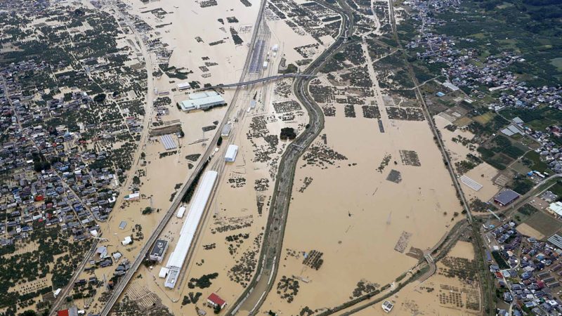This photo shows a flooded area in Nagano, central Japan following Typhoon Hagibis , Monday, Oct. 14, 2019. The typhoon dropped record amounts of rain for a period in some spots, according to meteorological officials, causing more than 20 rivers to overflow. Some of the muddy waters in streets, fields and residential areas have subsided. But many places remained flooded, with homes and surrounding roads covered in mud and littered with broken wooden pieces and debris. (Kyodo News via AP)