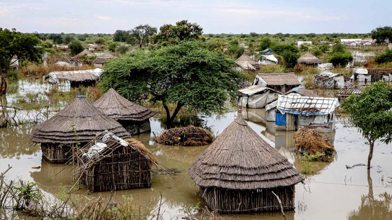 Submerged houses are seen in a flooded area that has been isolated for about a month and half due to the heavy rain in Pibor Town, Boma state, eastern South Sudan, on November 6, 2019. - The governor of Boma State explained 76 people have died and over 400000 people are displaced in the state. The Government of South Sudan declared a state of emergency in areas affected by the flood on October 27, 2019, and the United Nations and non-governmental organizations are responding to assessed needs, in support of the Government. (Photo by Peter LOUIS / AFP)