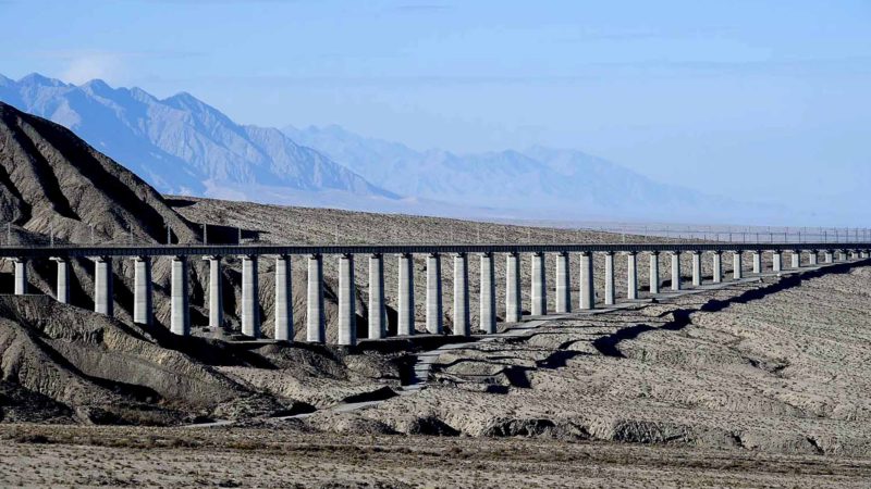 (191121) -- RUOQIANG, Nov. 21, 2019 (Xinhua) -- Photo taken on Nov. 18, 2019 shows a railway bridge, which is part of the Golmud-Korla railway, in Ruoqiang County, northwest China's Xinjiang Uygur Autonomous Region. The Golmud-Korla railway, linking the city of Golmud in northwest China's Qinghai Province and the city of Korla in Xinjiang, uses railway bridges in multiple sections for ecological considerations, allowing water flow and passage for animals. (Xinhua/Song Yanhua)