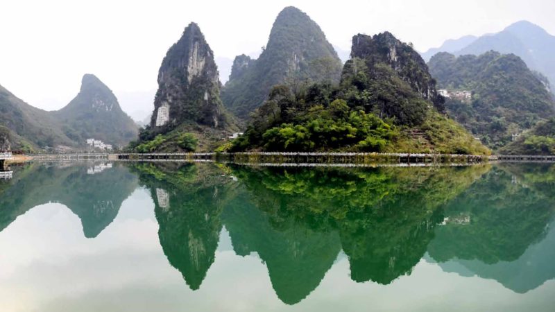 (191126) -- BEIJING, Nov. 26, 2019 (Xinhua) -- Photo taken on Nov. 24, 2019 shows a view at the Haokun Lake scenic area in Lingyun County of Baise City, south China's Guangxi Zhuang Autonomous Region. (Xinhua/Zhang Ailin)