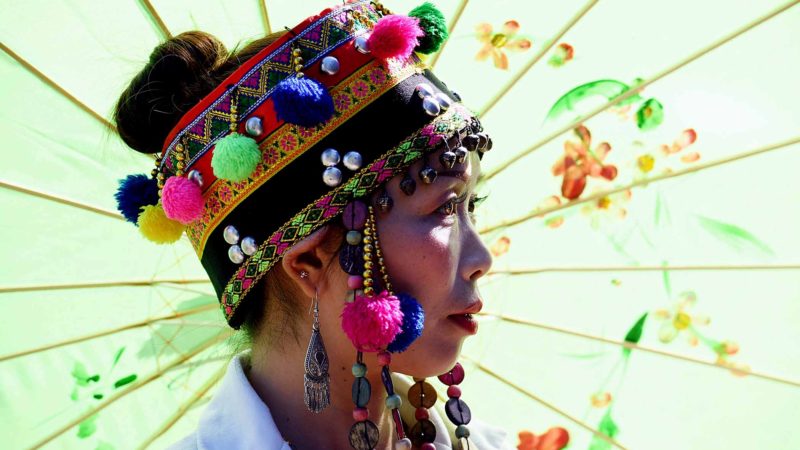 BEIJING-- A woman of the Yao ethnic group is seen at the folk Panwang Festival in Mengban Town of Mengla County, Xishuangbanna Dai Autonomous Prefecture in southwest China's Yunnan Province, Nov. 17, 2019. Xinhua/RSS.