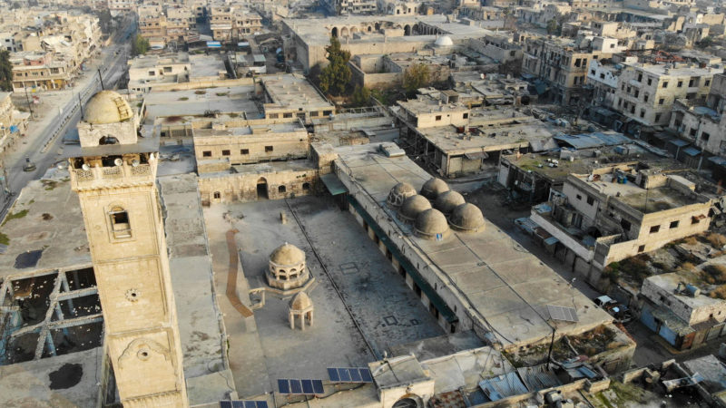 A drone picture taken on December 23, 2019 shows empty streets and damaged buildings in the town of Maaret Al-Numan in the northwestern Idlib province. - Regime forces have seized dozens of towns and villages in northwest Syria from jihadists following days of violent clashes, fuelling an exodus of civilians, the Britain-based Syrian Observatory for Human Rights said. Heightened regime and Russian bombardment on the Maaret al-Numan region since December 16 has forced tens of thousands of vulnerable people to flee their homes, according to the United Nations. (Photo by Omar HAJ KADOUR / AFP)