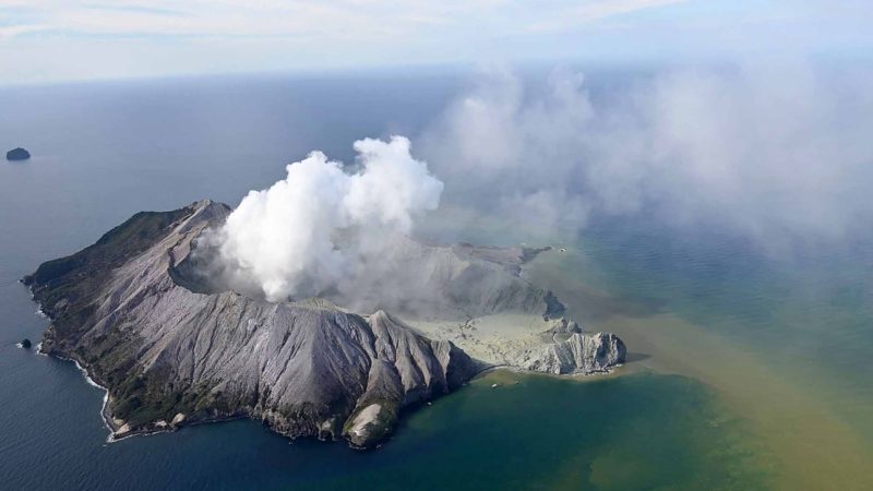 This aerial photo shows White Island after its volcanic eruption in New Zealand Monday, Dec. 9, 2019. The volcano on a small New Zealand island frequented by tourists erupted Monday, and a number of people were missing and injured after the blast. (George Novak/New Zealand Herald via AP)