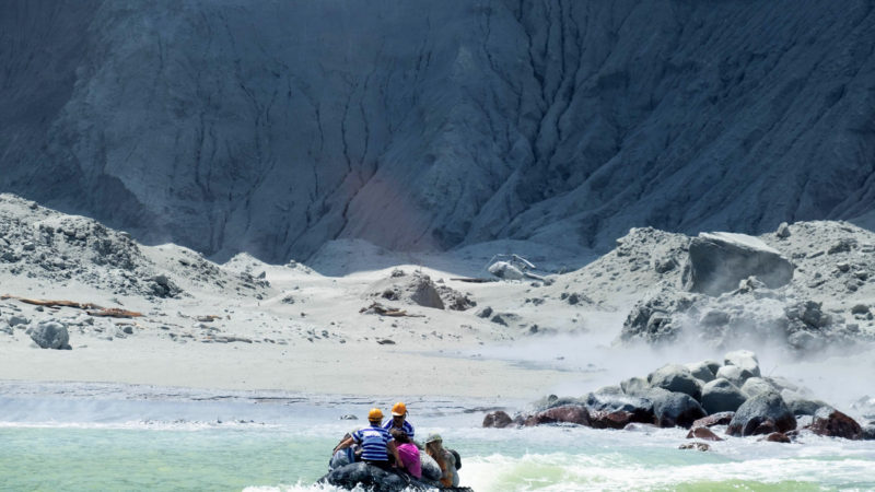 This Dec. 9, 2019, photo provided by Michael Schade shows the rescuers' boat leaving White Island following the eruption of the volcano, New Zealand. Unstable conditions continued to hamper rescue workers from searching for people missing and feared dead after the volcano off the New Zealand coast erupted in a towering blast of ash and scalding steam while dozens of tourists explored its moon-like surface. Photo / RSS