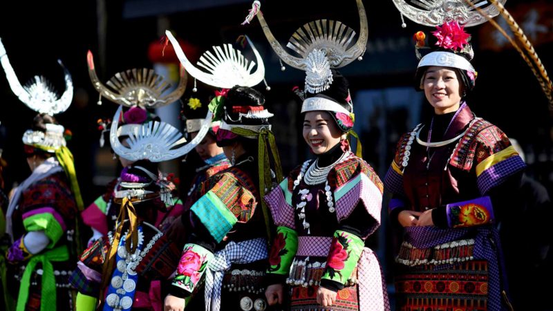 (191208) -- DANZHAI, Dec. 8, 2019 (Xinhua) -- Women of Miao ethnic group in traditional costumes attend a celebration of Jiyou Festival, a traditional folk festival, in Danzhai County of Qiandongnan Miao and Dong Autonomous Prefecture, southwest China's Guizhou Province, Dec. 7, 2019. (Xinhua/Yang Wenbin)