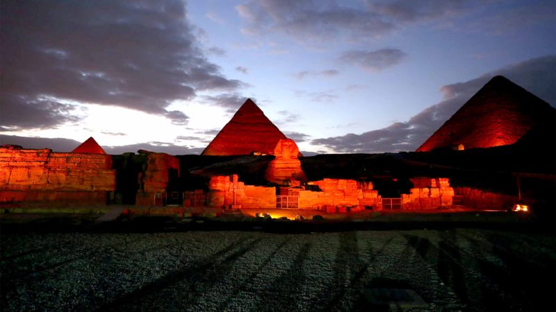  GIZA (EGYPT) -- The Sphinx and pyramids are illuminated in red in Giza, Egypt, on Jan. 23, 2020. The Pyramids and the Sphinx in Giza near Cairo have been shining in red in a ceremonial sound and light show on Thursday evening as part of the celebrations of China's Spring Festival, also known as the Chinese New Year. (Xinhua/Ahmed Gomaa)