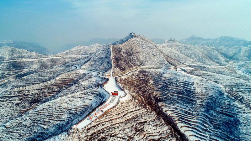 BEIJING-- Aerial photo taken on Jan. 8, 2020 shows the snow-covered terraced fields in Houchi Village of Shexian County, north China's Hebei Province. (Xinhua/Wang Xiao)