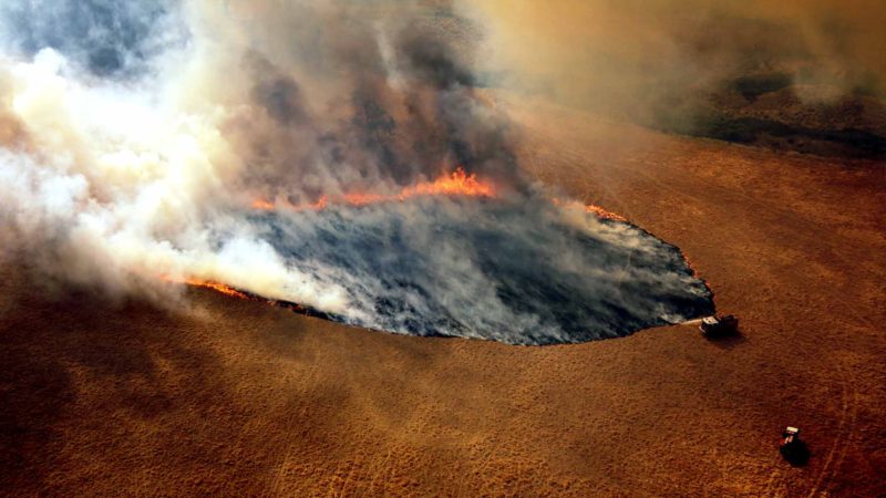BEIJING -- Photo taken on Dec. 20, 2019 shows fire trucks working at Lexton bush fire site in western Victoria, Australia. (Wayne Riggs/CFA/Handout via Xinhua)