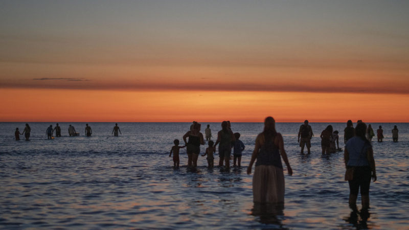 People enter the sea as they participate in a ritual to honor the African sea goddess Yemanja, at a beach in Montevideo, Uruguay, Sunday, Feb. 2, 2020. Thousands of worshippers come to the beach on Yemanja's feast day, bearing candles, flowers, perfumes and fruit to show their gratitude for her blessings. The celebration coincides with the Roman Catholic Feb. 2 feast day of the Virgin of Candelaria. AP Photo/RSS