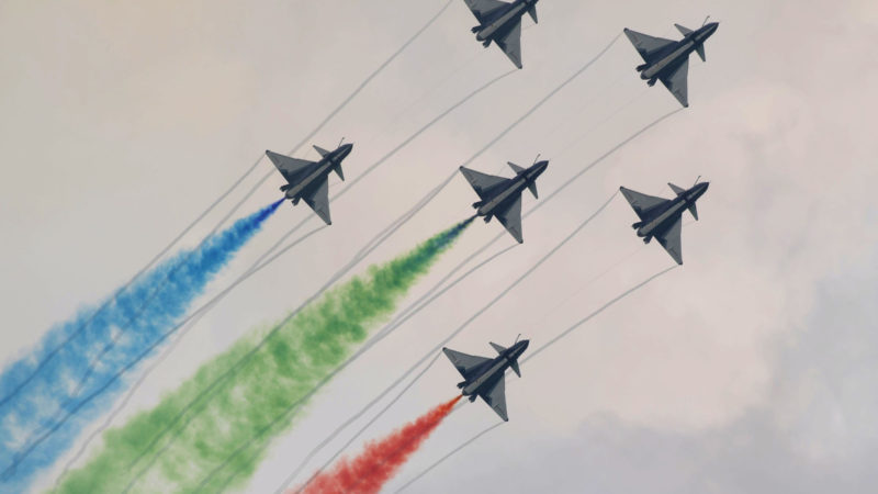 Members of the Chinese People's Liberation Army Air Force's Bayi Aerobatic Team fly J-10 performance aircraft as they take part in an aerial display during a media preview ahead of the Singapore Airshow in Singapore on February 9, 2020. Photo/RSS