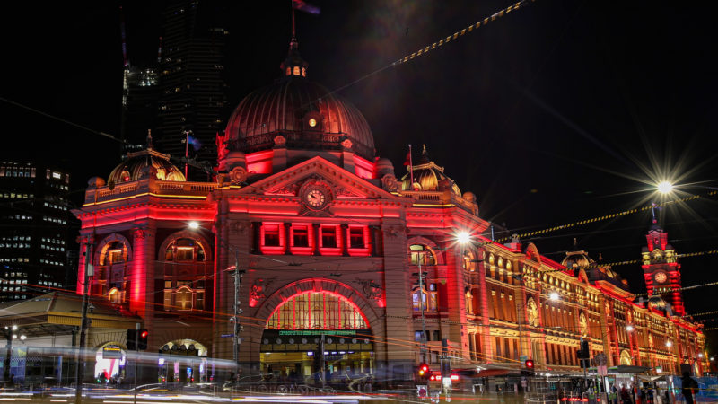 Flinders Street Station is lit up in red in Melbourne, Australia, Feb. 21, 2020. As China is fighting the outbreak of COVID-19, the Victorian state government of Australia launched a new campaign on Thursday to show their support for the Chinese communities at home and abroad.  Photo/RSS