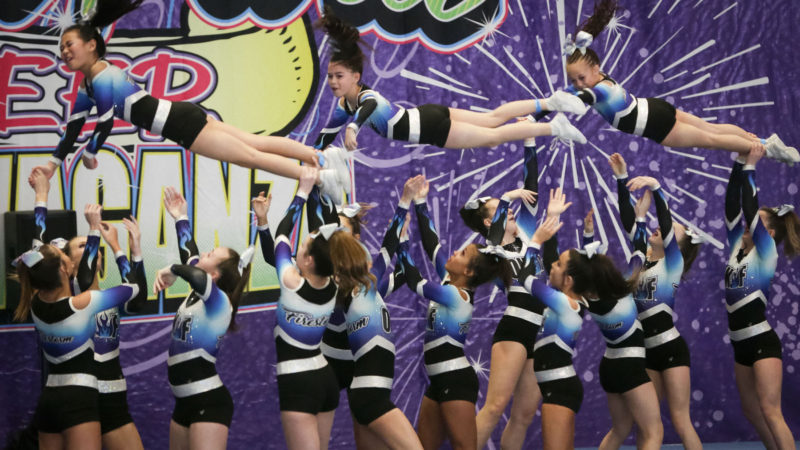 Athletes perform during the 8th "Mardi Parti" Cheer Extravaganza at Richmond Olympic Oval in Richmond, Canada, Feb. 22, 2020. Thousands of cheerleading athletes of different levels teamed up to participate in the annual event. Photo/RSS