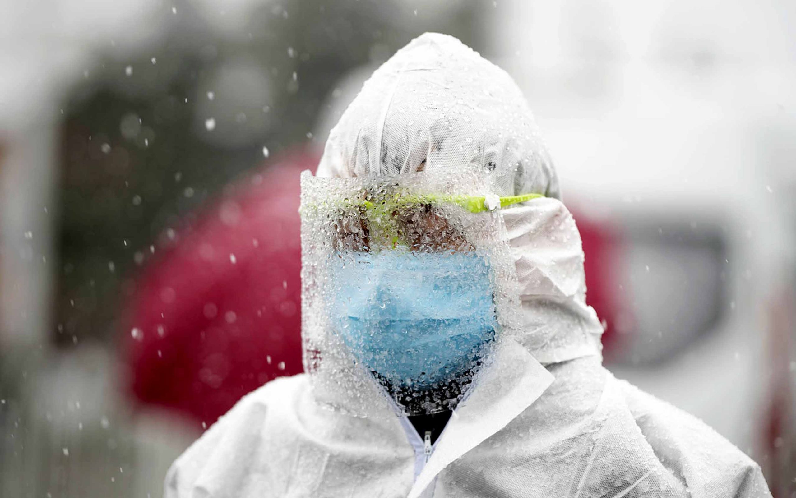 (200216) -- BEIJING, Feb. 16, 2020 (Xinhua) -- Photo taken on Feb. 15, 2020 shows a police officer at the "Wuhan Livingroom" makeshift hospital in Wuhan, central China's Hubei Province. The first batch of 17 cured COVID-19 patients are discharged from the "Wuhan Livingroom" makeshift hospital on Saturday. (Xinhua/Cai Yang)