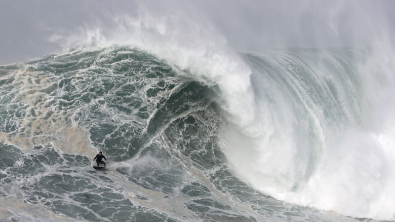 Sebastian Steudtner from Germany rides a wave during a tow surfing session at Praia do Norte or North Beach in Nazare, Portugal, Saturday, Feb. 15, 2020. AP Photo/RSS