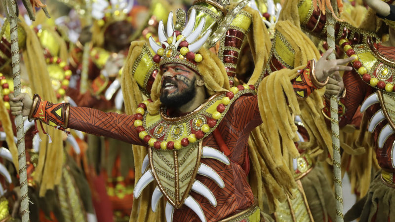 A dancer from the Tom Maior samba school performs during a carnival parade in Sao Paulo early Saturday, Feb. 22, 2020. AP Photo/RSS