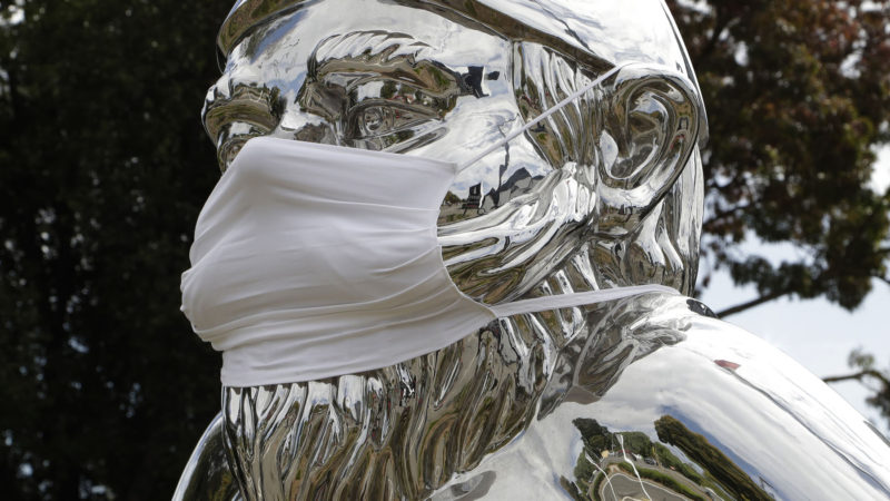 A statue outside a restaurant wears a mask in central Christchurch, New Zealand, Monday, March 23, 2020. New Zealand Prime Minister Jacinda Ardern announced Monday that schools and non-essential services across New Zealand will be closed as part of the measures as the government put the country in lockdown to try to stop the spread of coronavirus pandemic. AP PhotoRSS