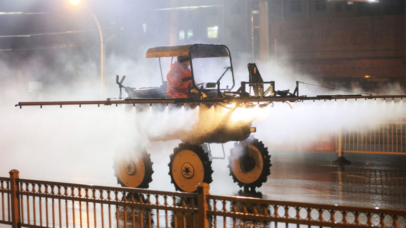 This photo taken on March 2, 2020 shows a worker spraying disinfectant on a road in Yunmeng county, Xiaogan city, in China's central Hubei province. - The world has entered uncharted territory in its battle against the deadly coronavirus, the UN health agency warned, as new infections dropped dramatically in China on March 3 but surged abroad with the US death toll rising to six. Photo/RSS