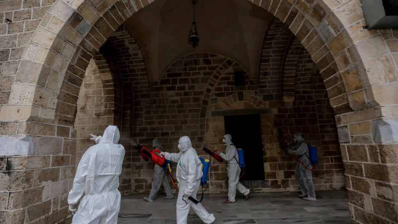 (200312) -- GAZA, March 12, 2020 (Xinhua) -- Palestinian workers sterilize al-Omari mosque in Gaza City, on March 12, 2020. Two weeks ago, Gaza established a field hospital at the Rafah crossing between Gaza and Egypt. The Palestinian coastal enclave of Gaza Strip is so far free of the novel coronavirus (COVID-19), thanks to the tightened measures taken to prevent the import of the virus. (Photo by Rizek Abdeljawad/Xinhua)