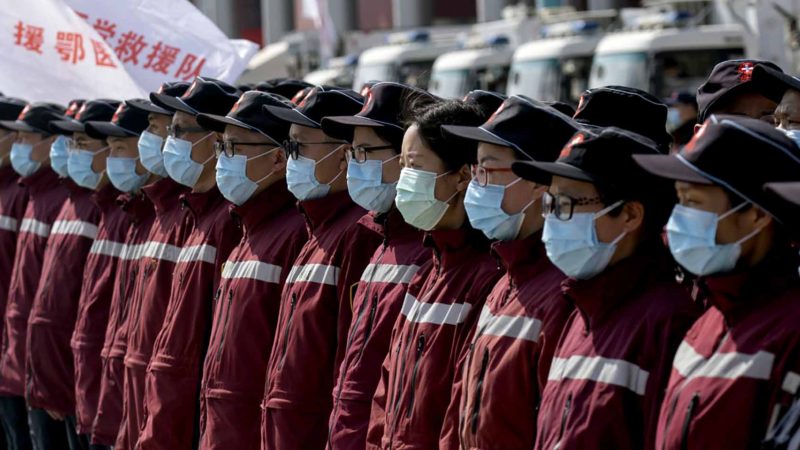 (200317) -- WUHAN, March 17, 2020 (Xinhua) -- National emergency medical rescue team members gather in front of a temporary hospital in Wuhan, central China's Hubei Province, March 17, 2020. Members of 15 national emergency medical rescue teams departed Hubei Province on Tuesday as the epidemic outbreak in the hard-hit province has been subdued. (Xinhua/Cai Yang)