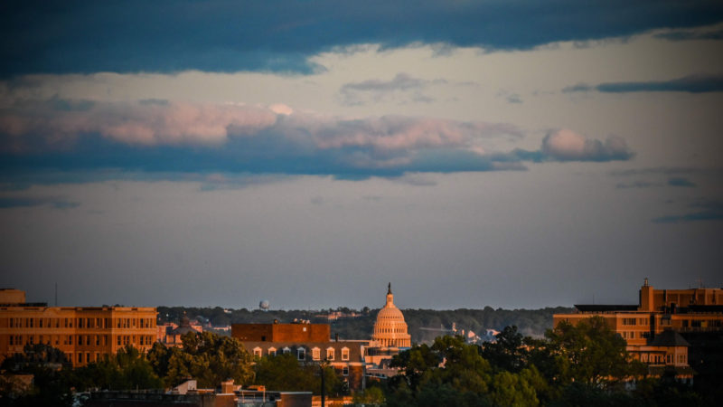 The sun sets on Washington DC as the Capitol of the US Congress is seen in the background on May 11, 2020. (Photo / RSS)