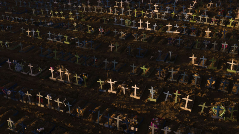 Crosses mark the graves of those who have passed away since early April, filling a new section of the Nossa Senhora Aparecida public cemetery amid the new coronavirus pandemic in Manaus, Brazil, Sunday, May 16, 2020. The new area was opened last month to cope with a sudden surge in deaths in the city, though most of the deceased were not tested for COVID-19. (AP Photo/RSS)