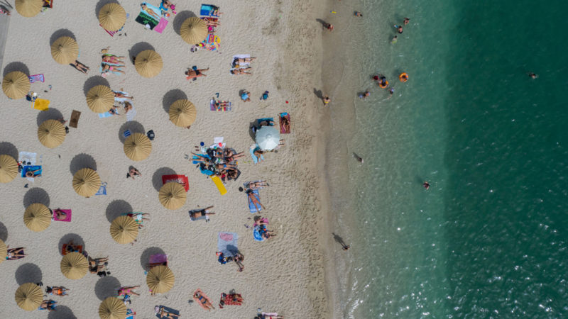 Aerial photo taken on May 14, 2020 shows people enjoying their leisure on Alimos public beach, south of Athens, Greece. Greek officials announced on Wednesday that as of May 16 the country's 515 organized beaches will open under restrictions to avoid overcrowding. Greece's Health Ministry reported on Thursday that the number of COVID-19 infections reached 2,770 and there have been 156 deaths since the start of the outbreak in the country on Feb. 26. (Photo by Lefteris Partsalis/RSS)