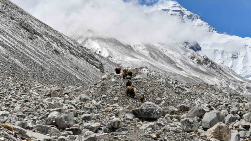 Photo taken on April 30, 2020 shows a yak transport team heading to the advance camp at an altitude of 6,500 meters on Mount Qomolangma. (Xinhua/Jigme Dorje)