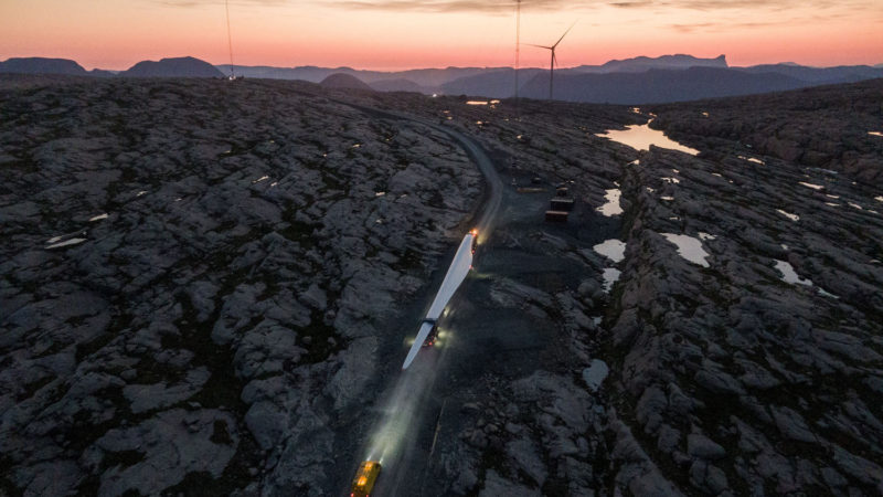 The wing of a wind turbine is on its way to the Gulesletten wind park just near Floro in western Norway Thursday June 18, 2020.  A total of 47 wind turbines are scheduled to be installed in this area, with each tower standing 90 meters high and each wing is 70 metres long. Photo/RSS