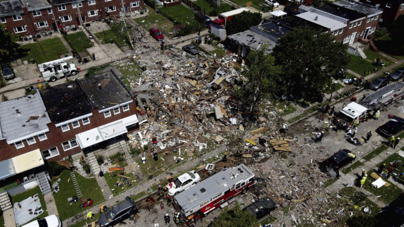 Debris and rubble covers the ground in the aftermath of an explosion in Baltimore on Monday, Aug. 10, 2020. (AP Photo/RSS)