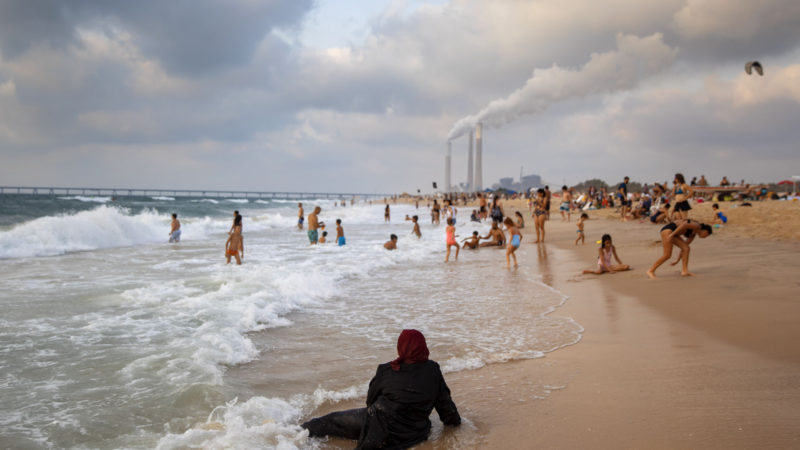 People enjoy the day on shore of the Mediterranean Sea at Zikim beach, near Kibbutz Zikim, on the Israeli-Gaza border, Israel, Saturday, Aug. 29, 2020. (AP Photo/RSS)