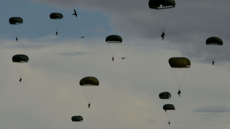 Indonesian paratroopers descend with their chutes during the Jalak Sakti military exercise held at the Sultan Iskandar Muda Air Force Base in Blang Bintang, Aceh province on September 8, 2020. (Photo/RSS)