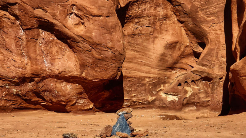 Photo provided by Kelsea Dockham, rocks mark the location where a metal monolith once stood in the ground in a remote area of red rock in Spanish Valley, Utah south of Moab near Canyonlands National Park. The mysterious silver monolith that was placed there has disappeared less than 10 days after it was spotted by wildlife biologists performing a helicopter survey of bighorn sheep, federal officials and witnesses said. (Photo/RSS)